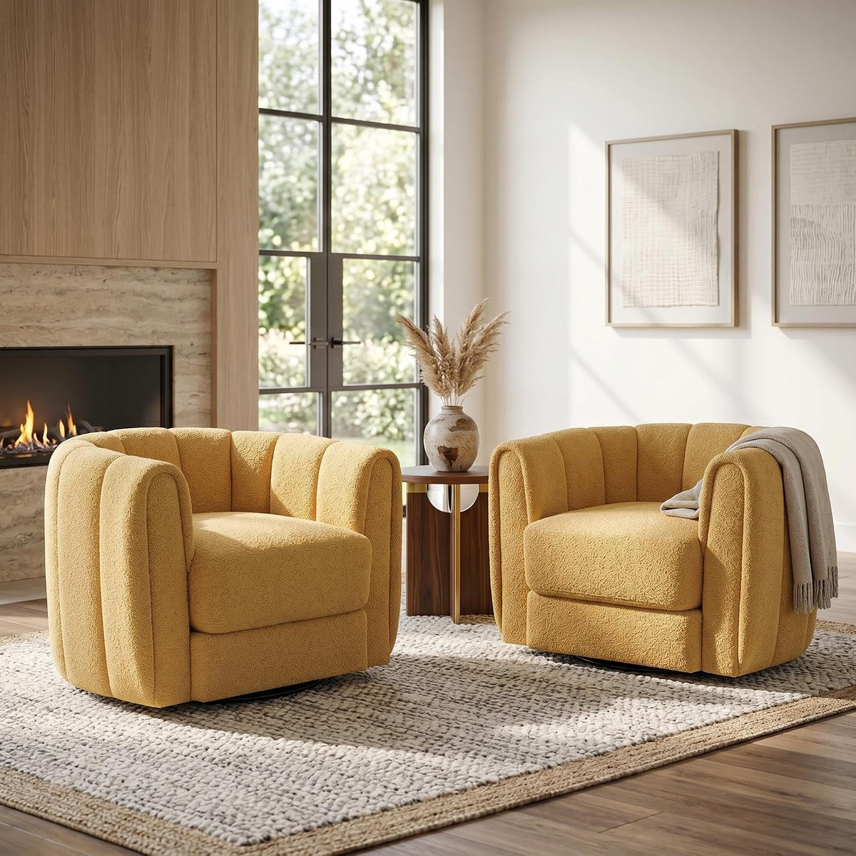 Two mustard-yellow round barrel swivel chairs on a textured rug beside a fireplace and window.