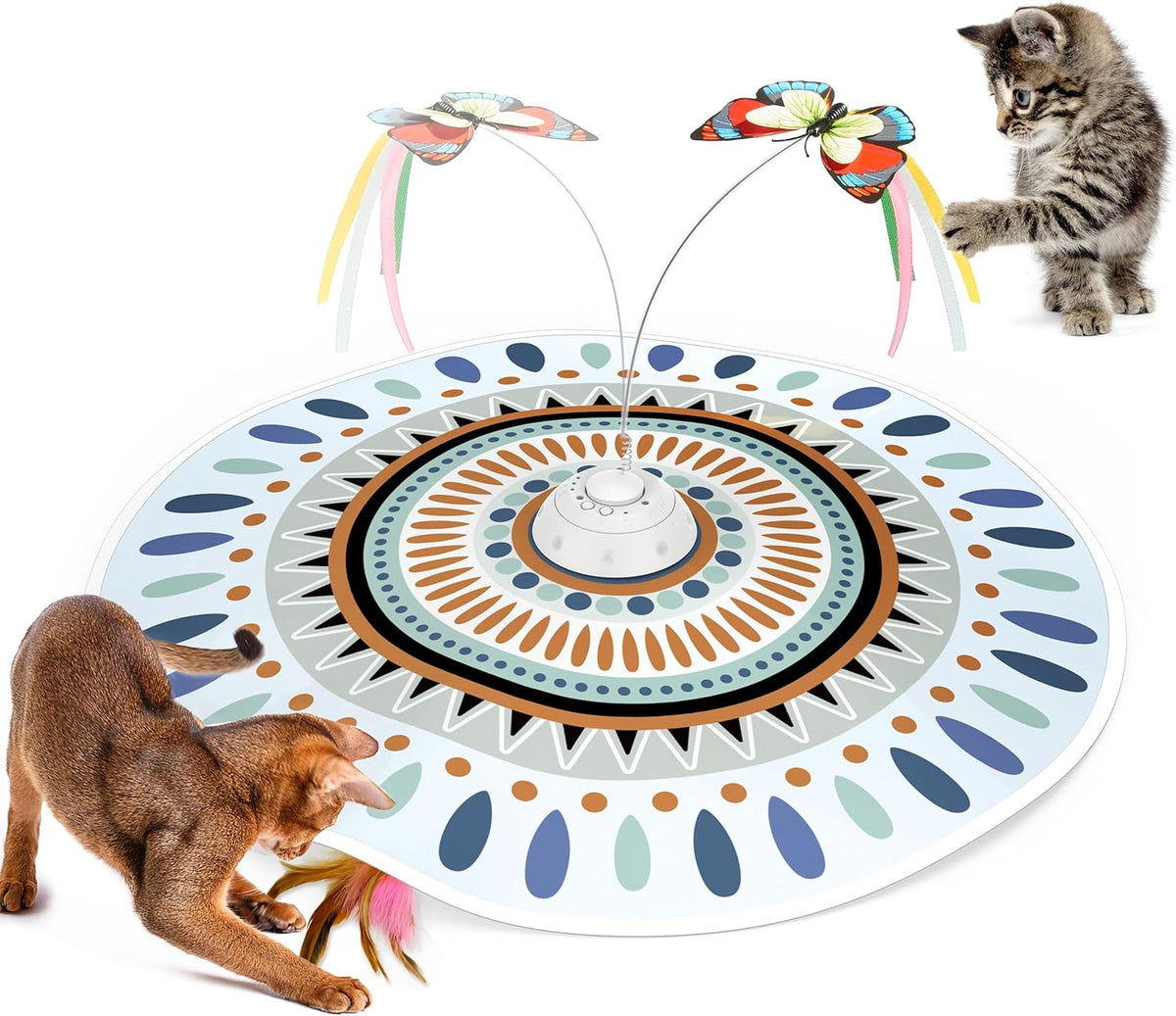 Top-down view of the patterned circular mat with central spinner and two curved metal wands; kittens at the edges.