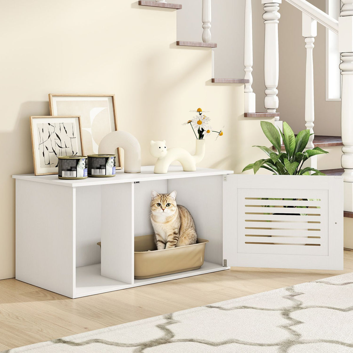 White enclosure with its door open and a cat sitting inside beside a staircase