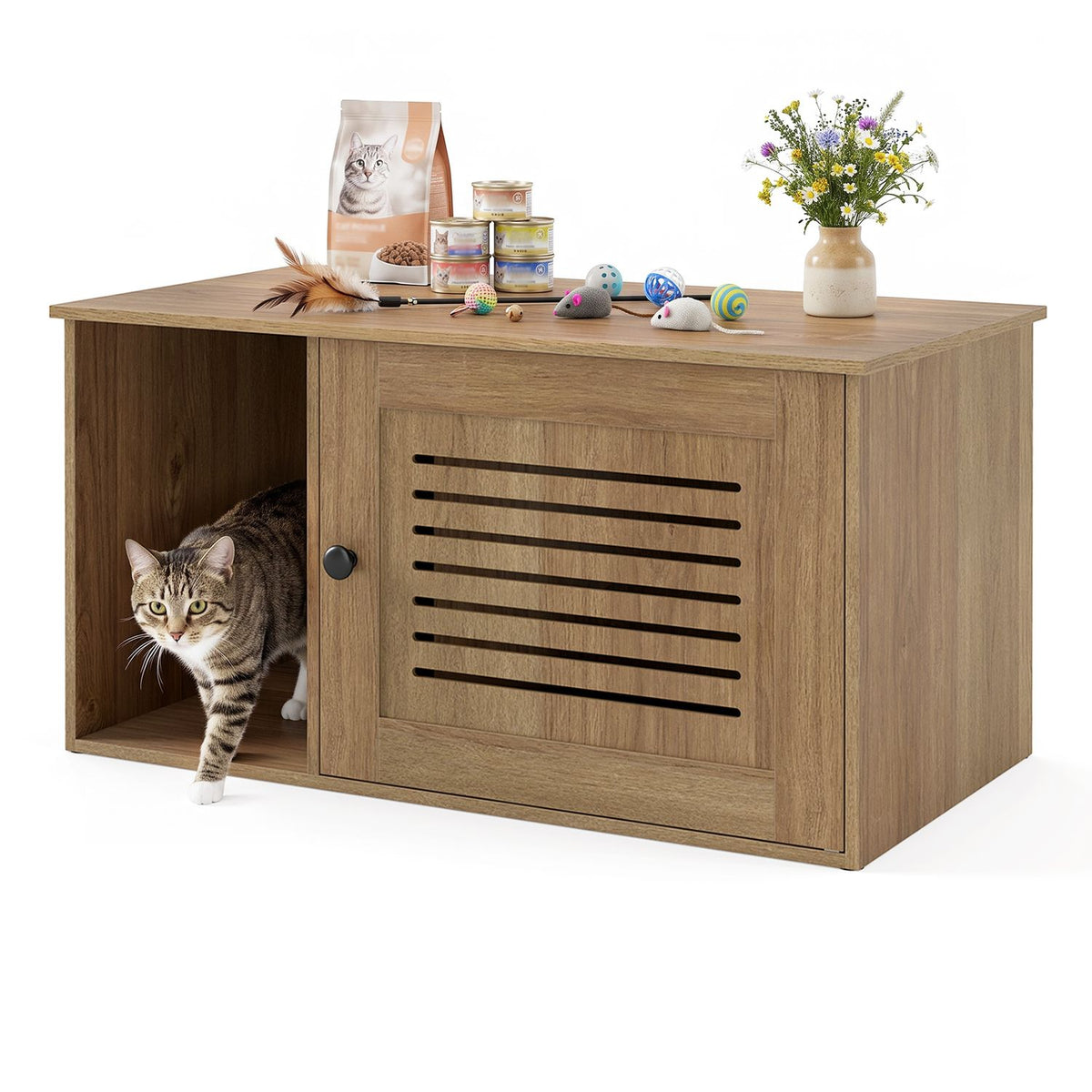 Wood-tone litter box cabinet with a cat emerging from the side entrance and toys and flowers on top.