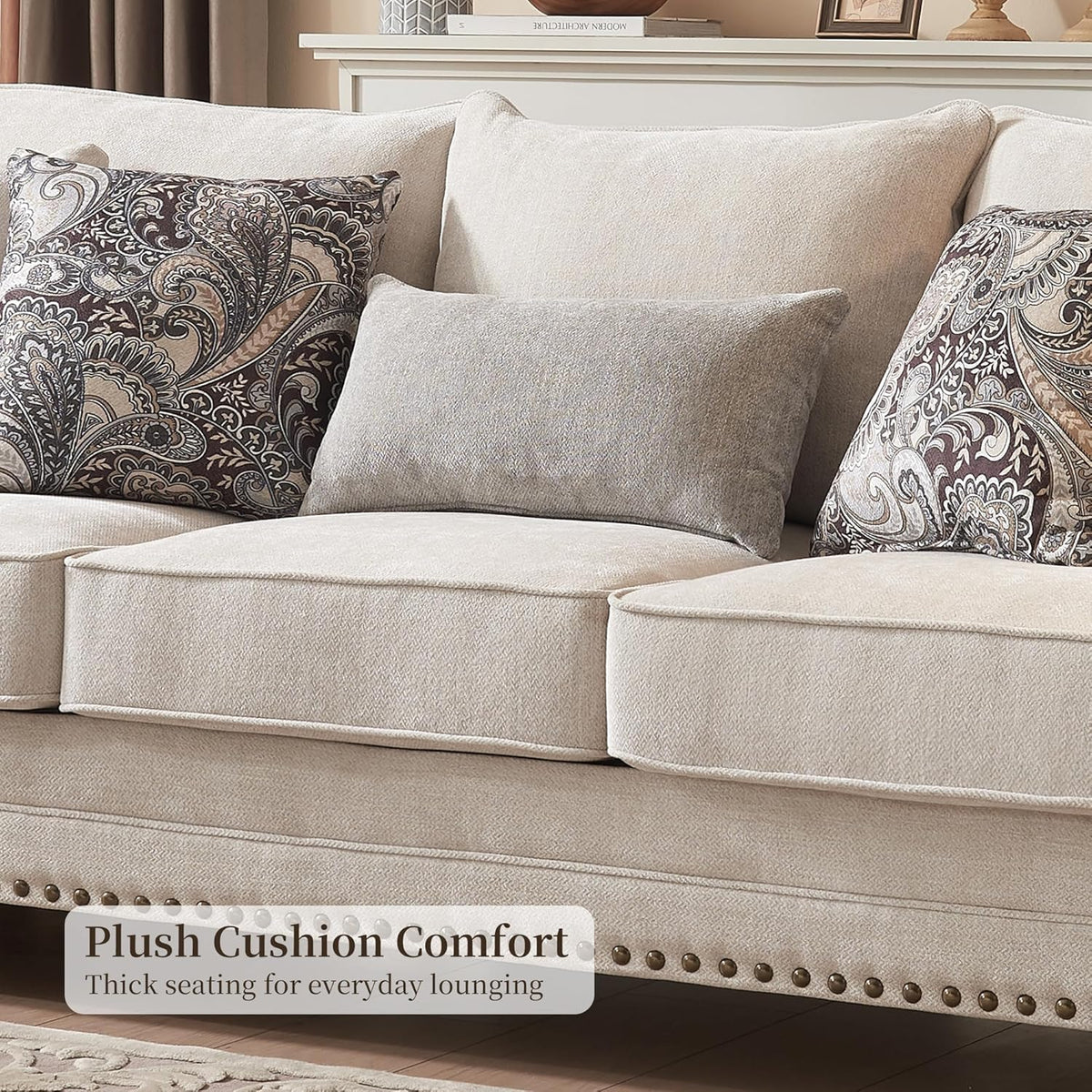 Close front view of three seat cushions with paisley and rectangular coordinating accent pillows