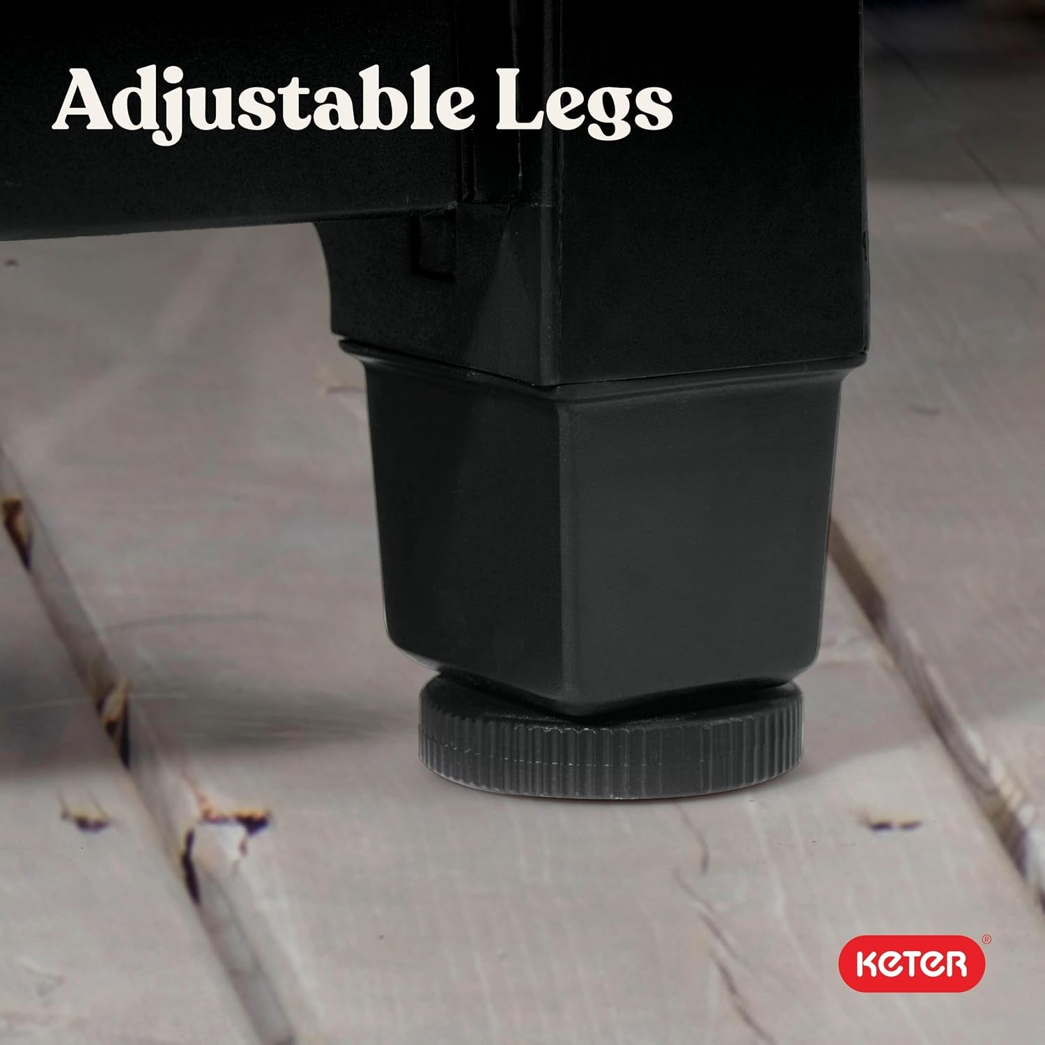 Close-up of a black adjustable plastic foot under the cart leg on a wooden floor
