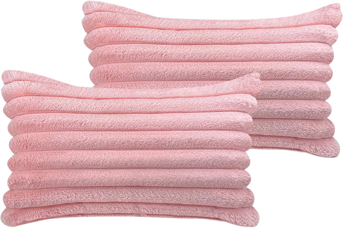 Pair of square faux-fur pillow covers in light pink with stacked vertical ribbed texture