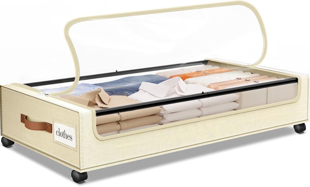 Cream-colored underbed storage box at an angle with its top flap open revealing folded clothes and caster wheels.