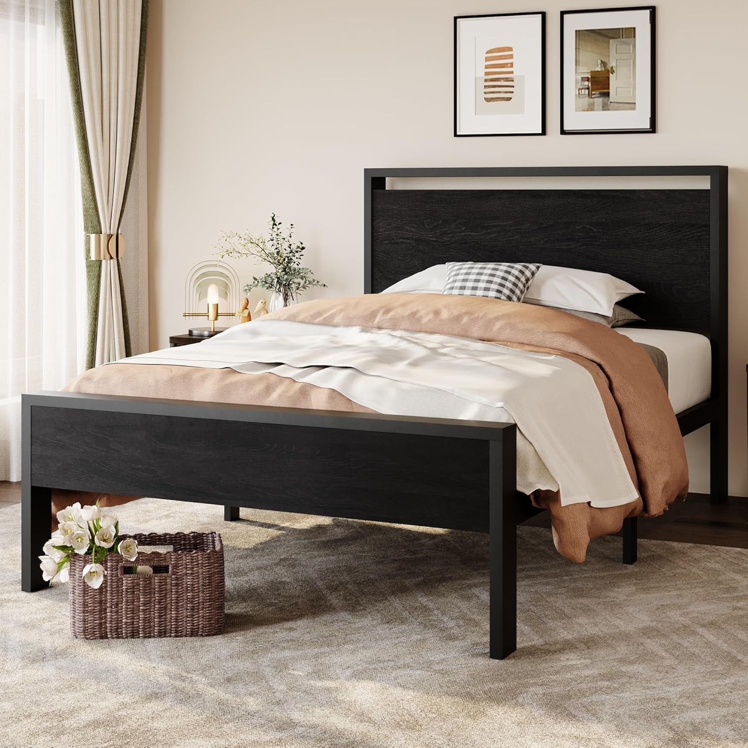 Black-framed platform bed with dark charcoal wood headboard and footboard in a bright bedroom
