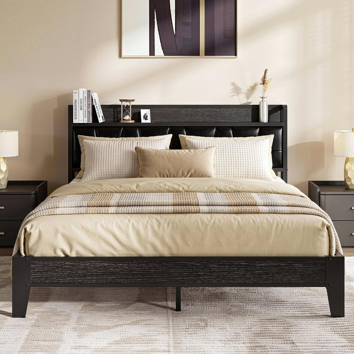 Front view of dark brown bed with black tufted headboard, tan bedding and decorative books on the headboard shelf.