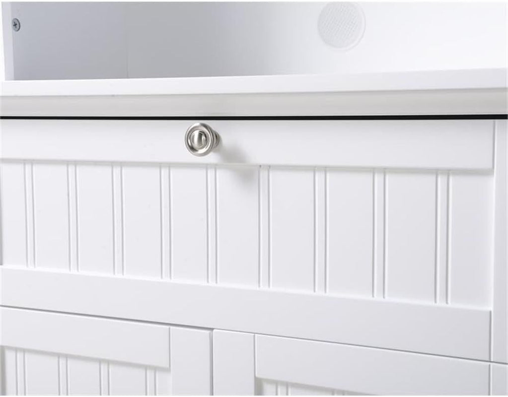 Close-up detail of the white beadboard drawer front and brushed aluminum–finished round pull