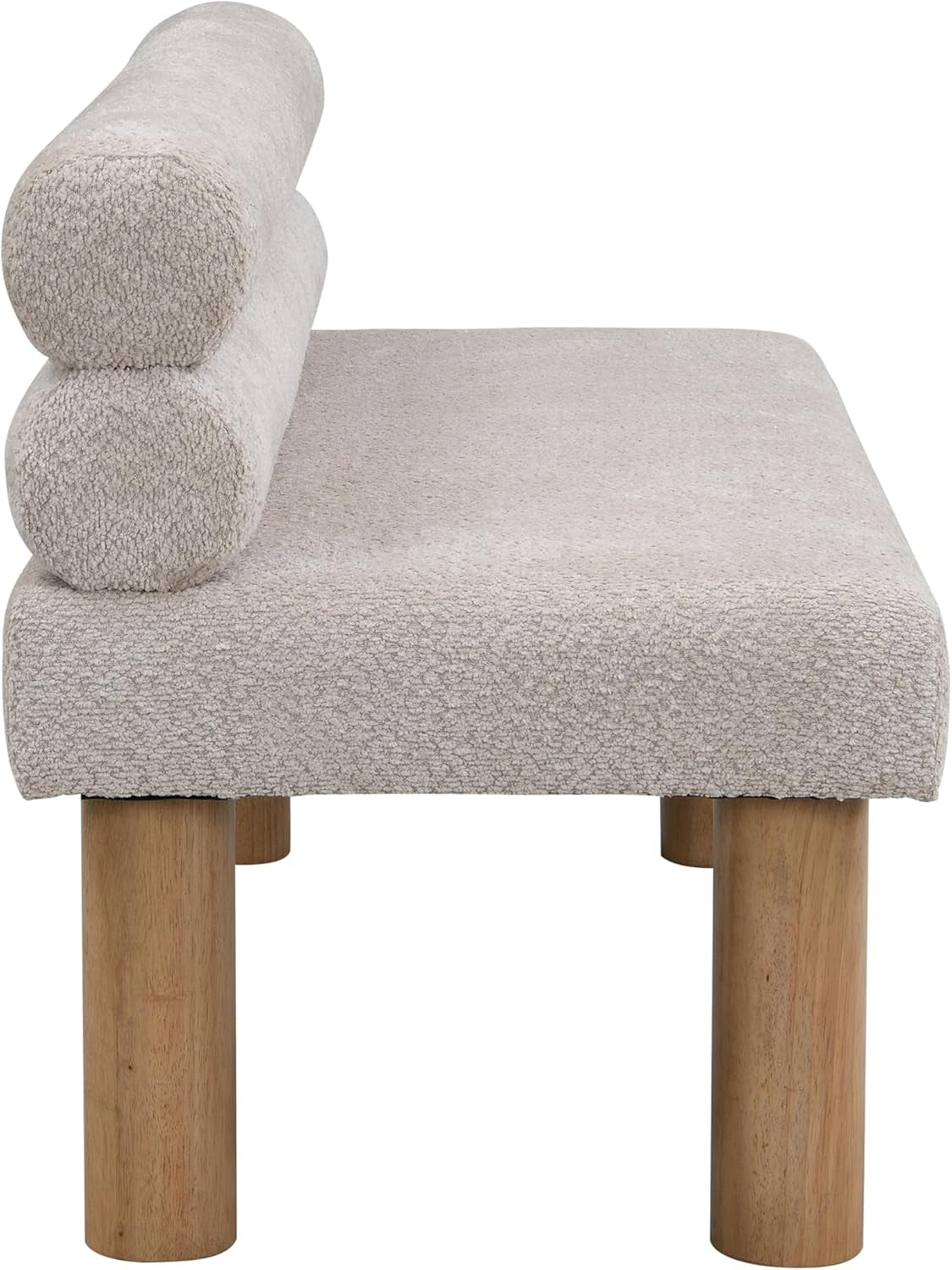 Side view of a low armless bench with boucle upholstery and round wooden legs.