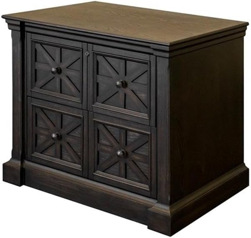 Low-angle three-quarter view of the file cabinet showing four decorative paneled drawer fronts and the molded base.
