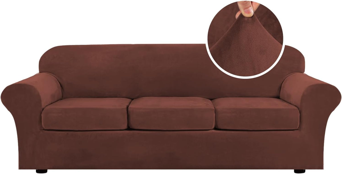 Front view of a chocolate brown three-seat sofa fitted with a plush stretch slipcover and inset fabric pinch close-up.