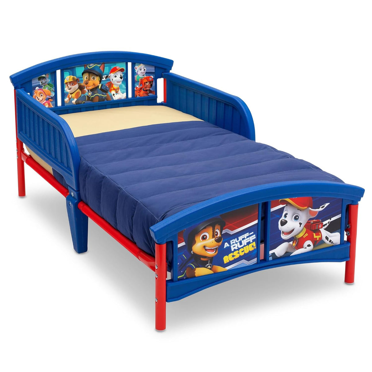 Blue and red toddler bed with PAW Patrol character panels and a navy quilted blanket, angled front view.