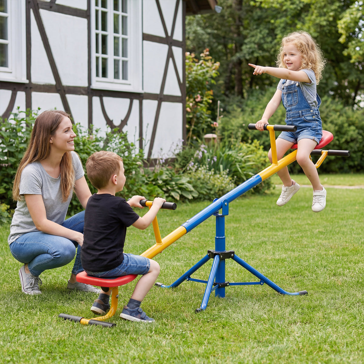 Two children ride a colorful seesaw in a garden while an adult watches nearby.