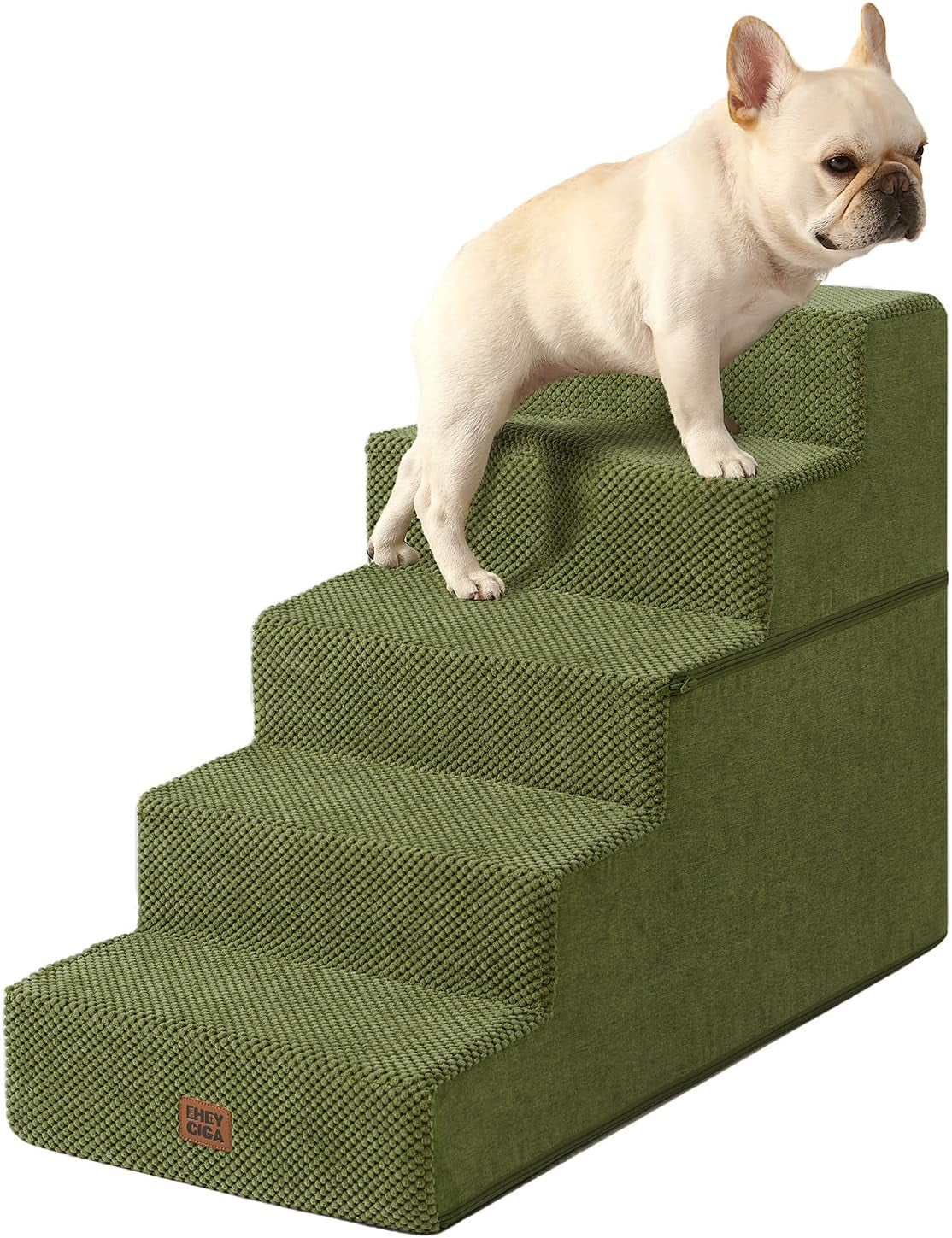 Small tan dog climbing a green four-step pet stair with textured tread and fabric side panel