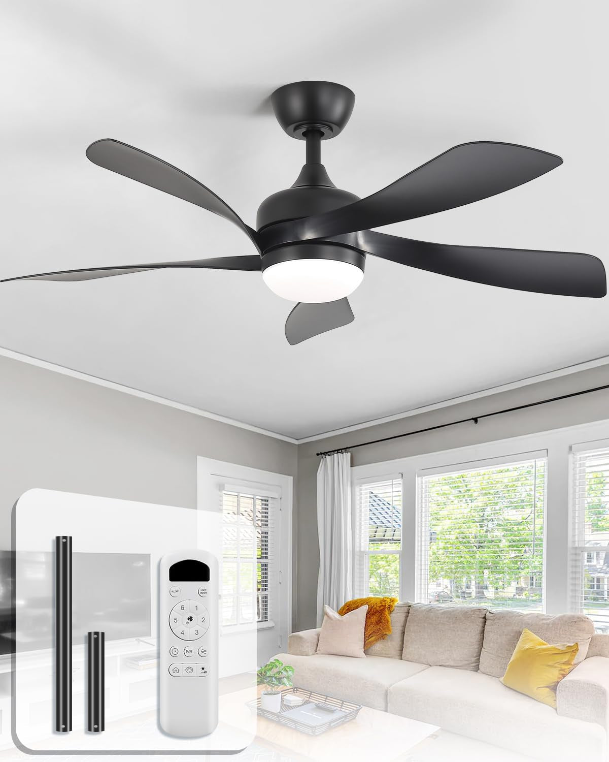 Installed black ceiling fan with five blades and lit dome light in a bright living room, inset shows remote and mounting
