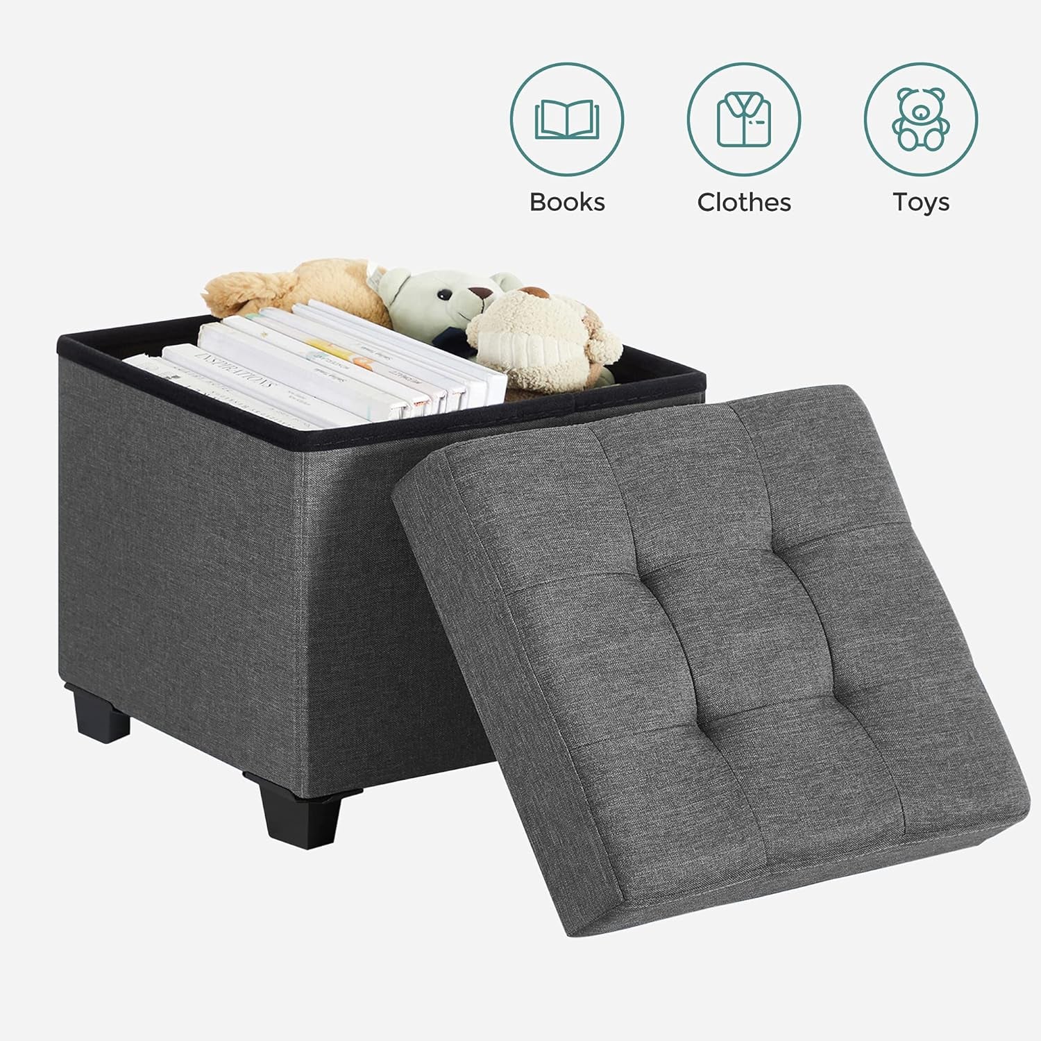 Charcoal square ottoman with its tufted lid removed showing books and stuffed toys inside.