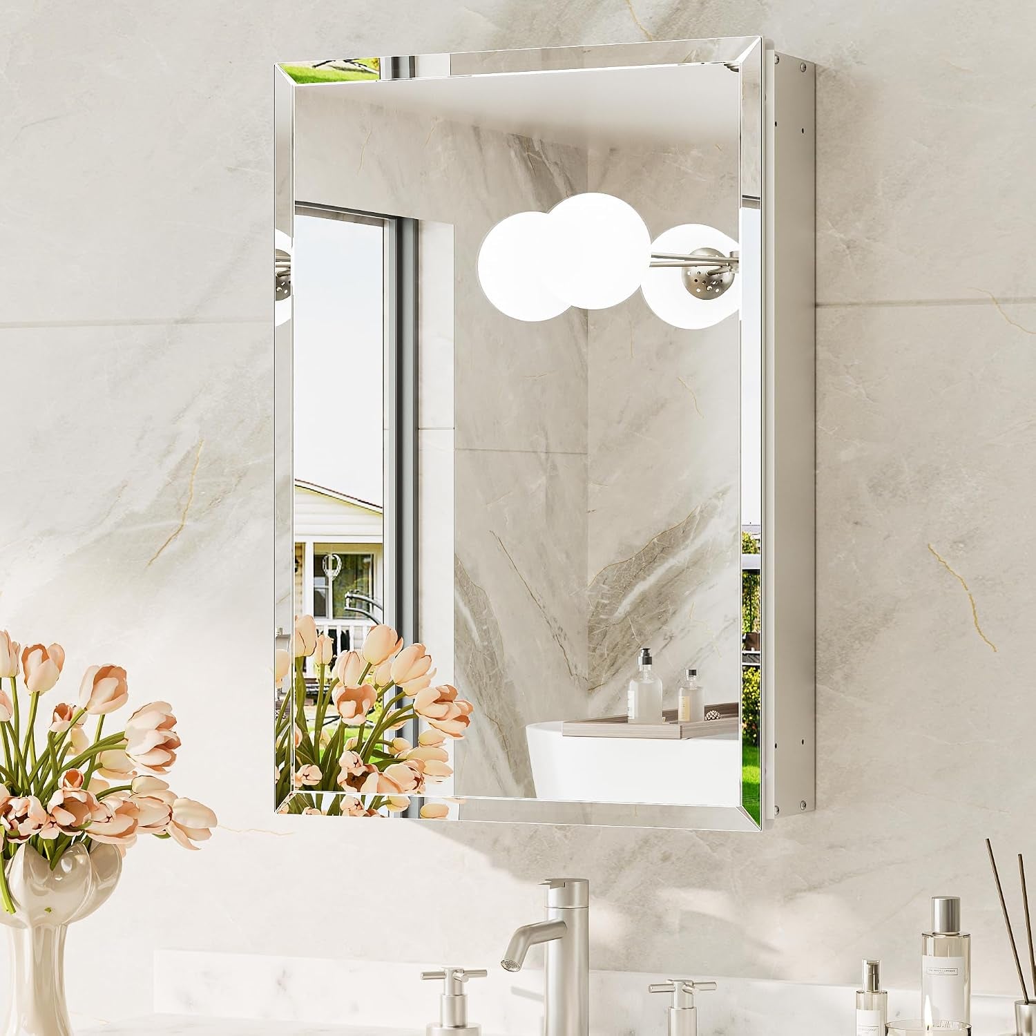 Single recessed mirrored cabinet above a sink, mirror reflecting window, globe light and a vase of tulips