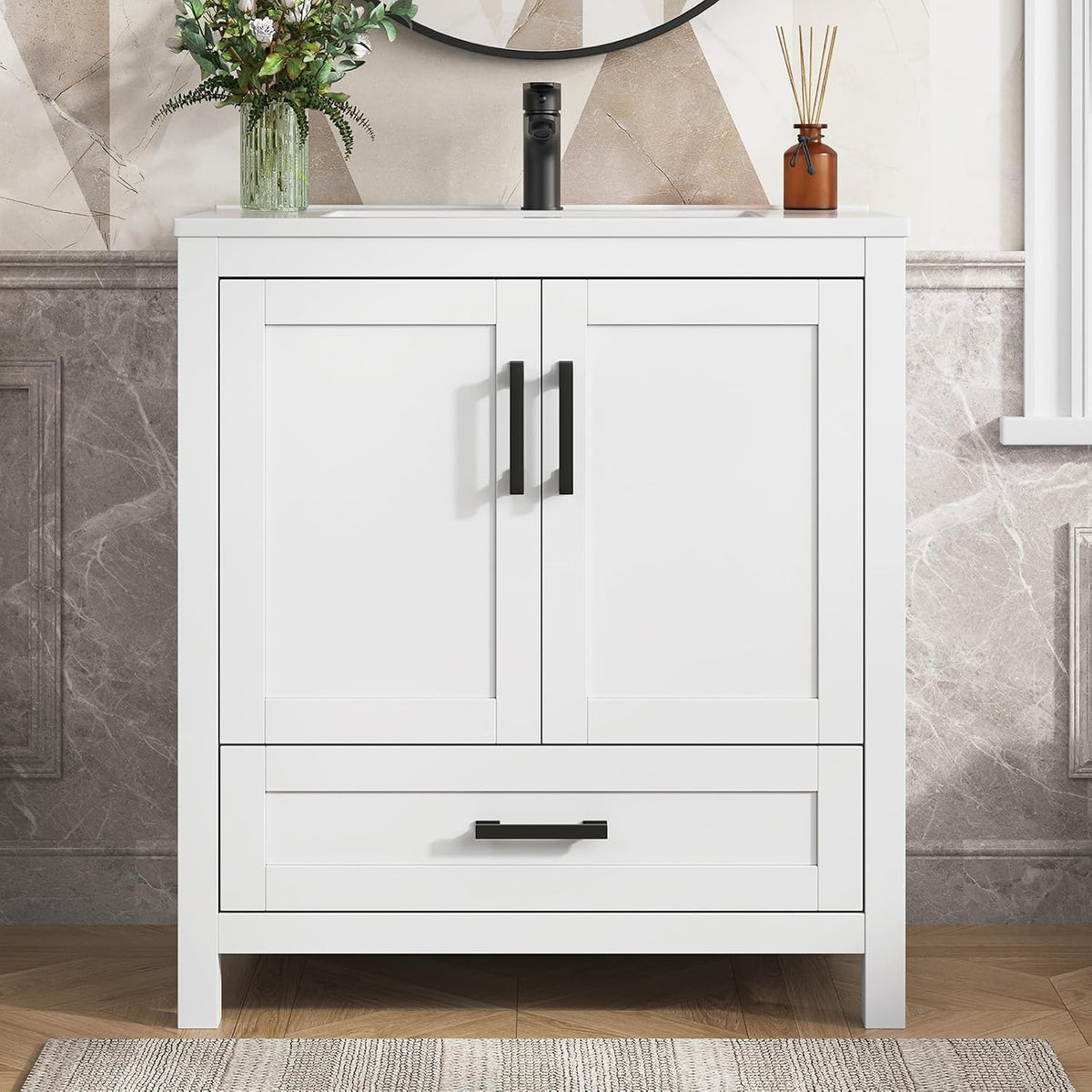 Front view of a white freestanding bathroom vanity with two center doors and a single bottom drawer.