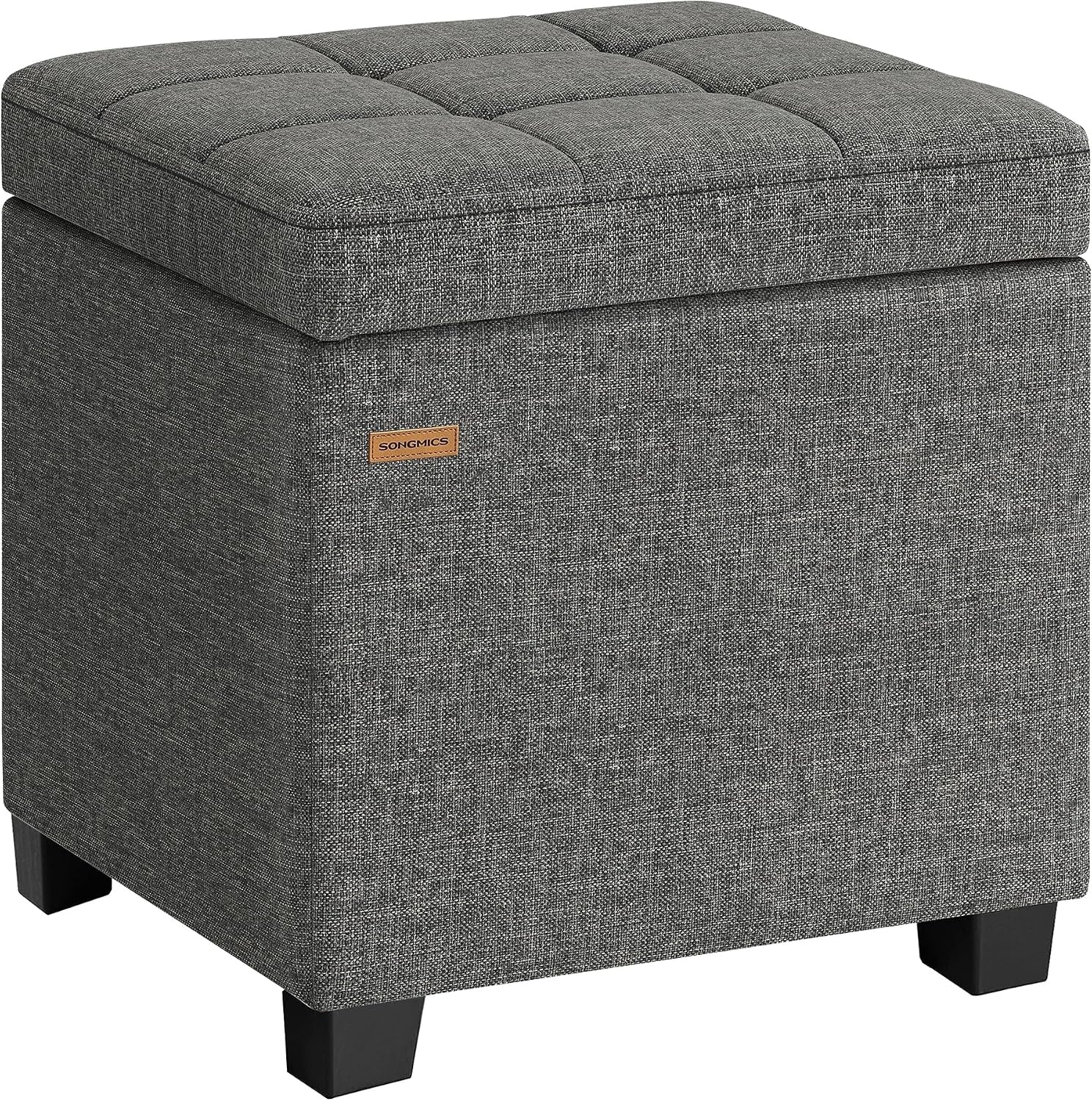 Square dark gray linen-look storage ottoman with tufted lid and black feet.