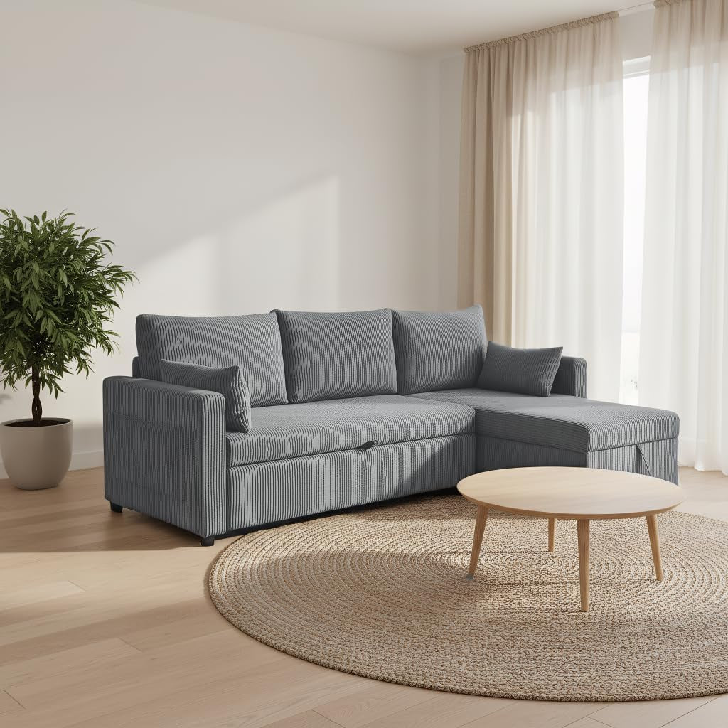 Right-facing grey corduroy sectional sleeper with chaise in bright room and round rug