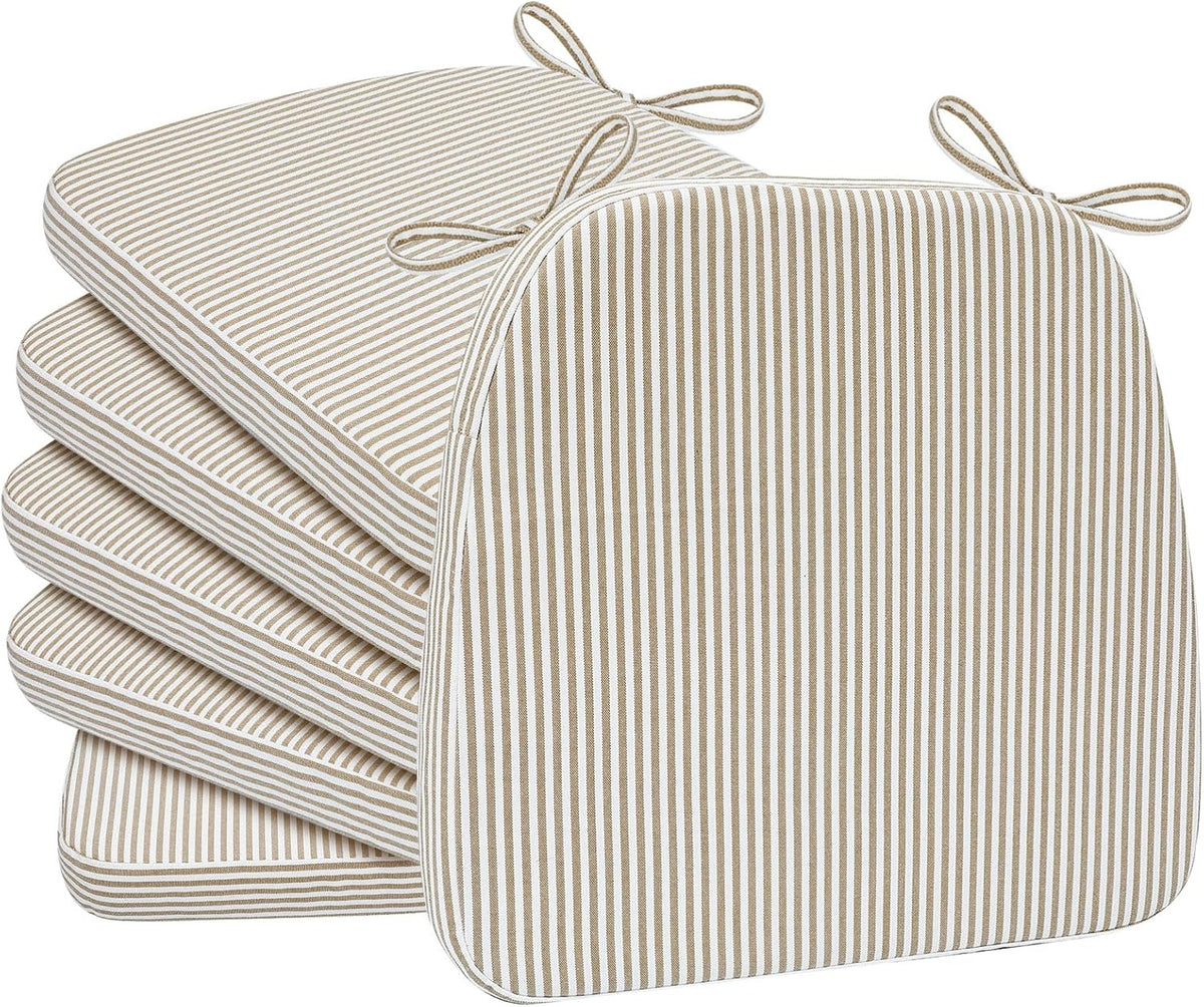 Stack of four thin tan-and-white striped D-shaped chair cushions with tied loops