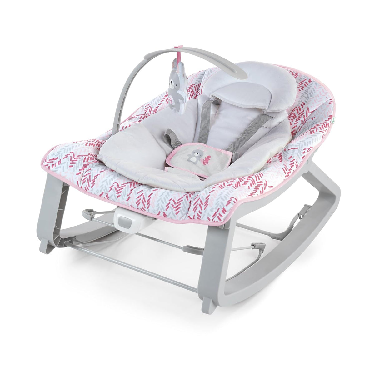 Angled view of a pink-and-gray baby bouncer with padded seat, toy bar and safety harness.