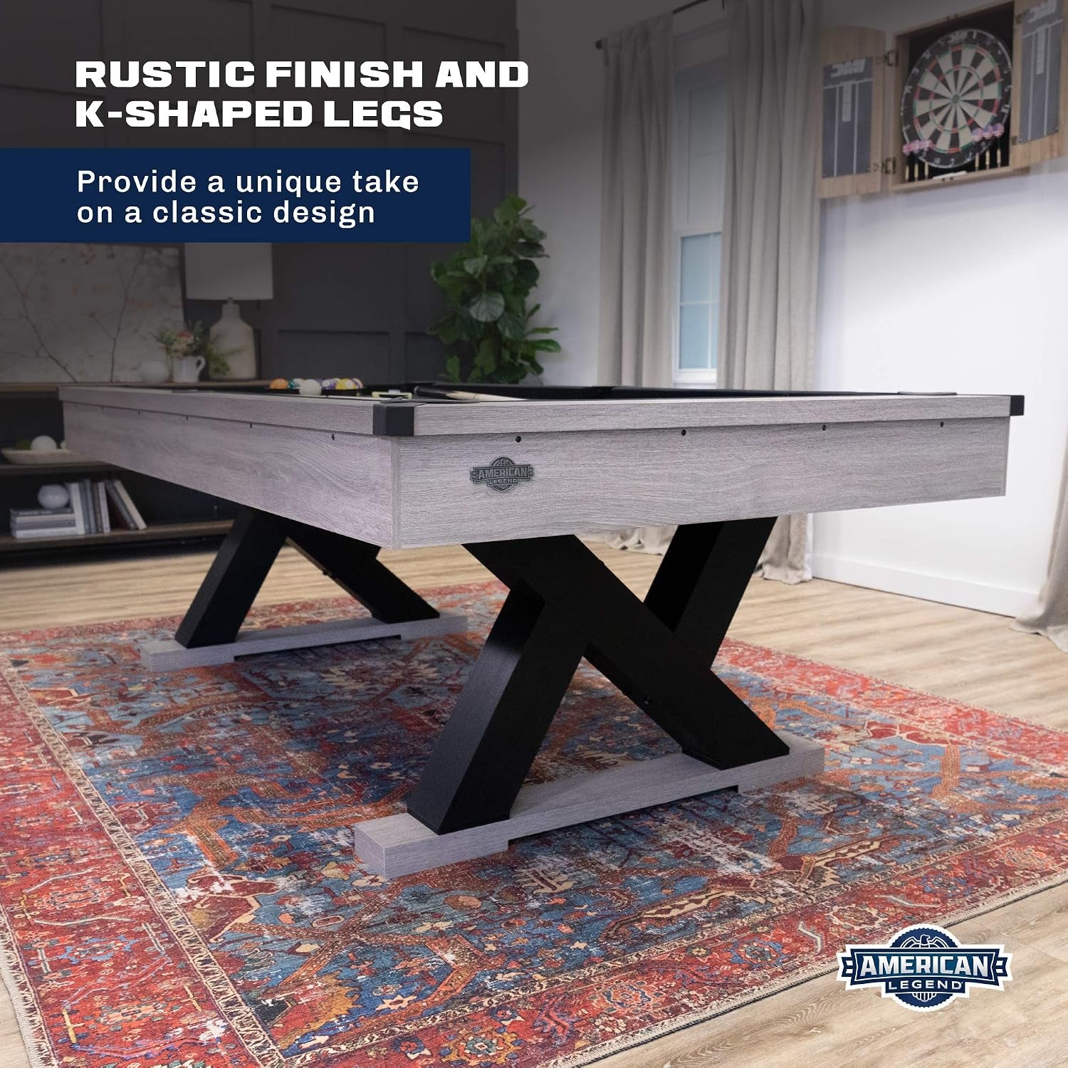 Rustic wood finish billiard table on a patterned rug showing black K-shaped legs and side profile in a staged room.