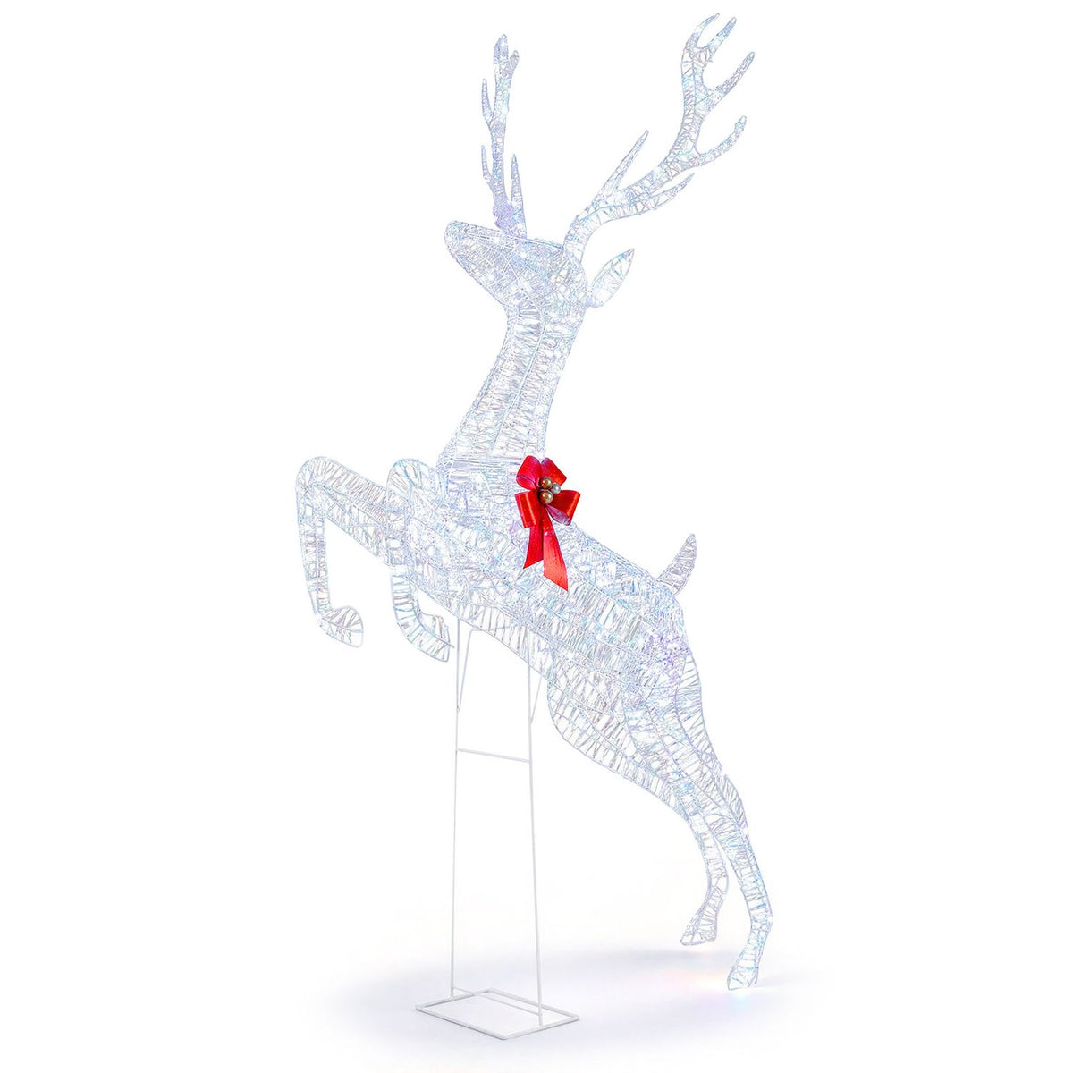 Angled view of the illuminated reindeer decoration, showing its raised antlers, red bow, and support frame.