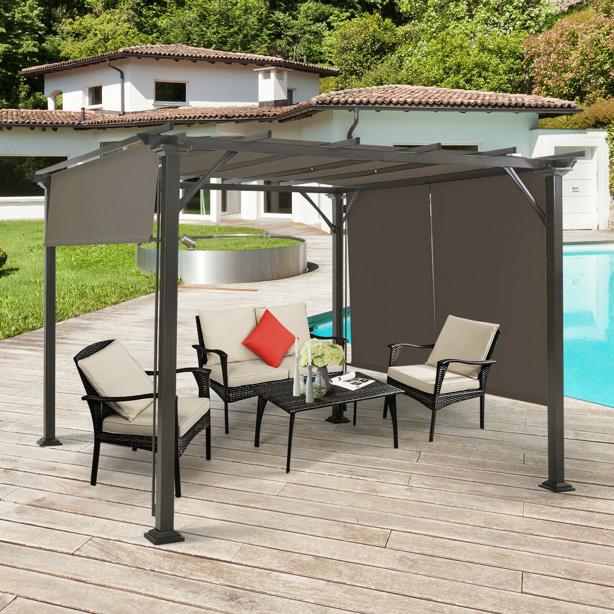 A dark-framed gazebo with brown canopy panels shelters four chairs and a coffee table on a deck beside a pool.
