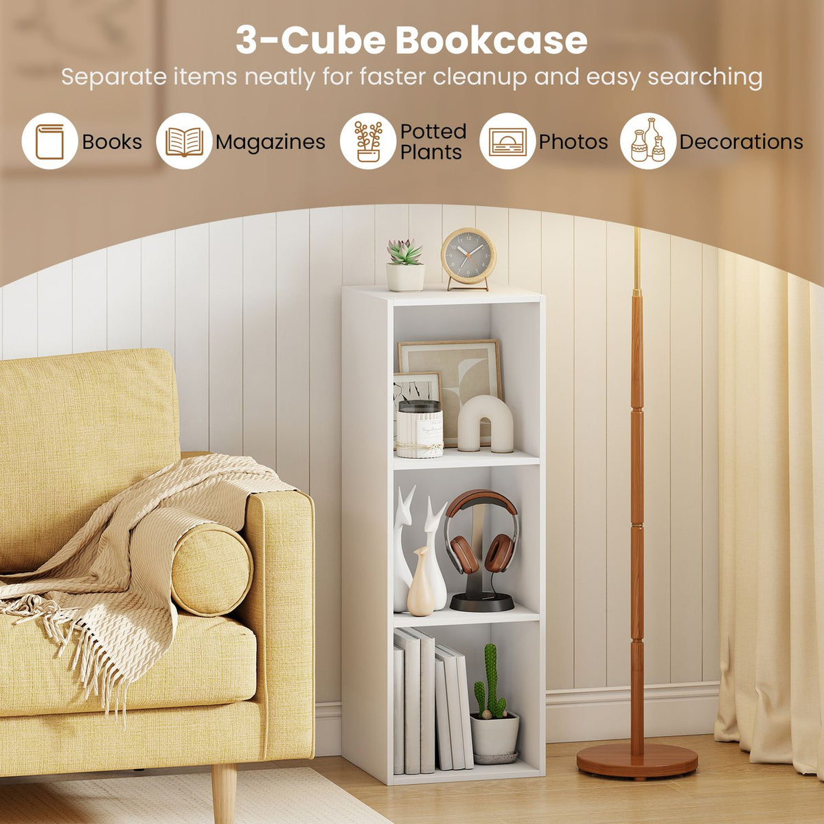 A narrow white three-cube bookcase stands beside a yellow sofa and floor lamp.