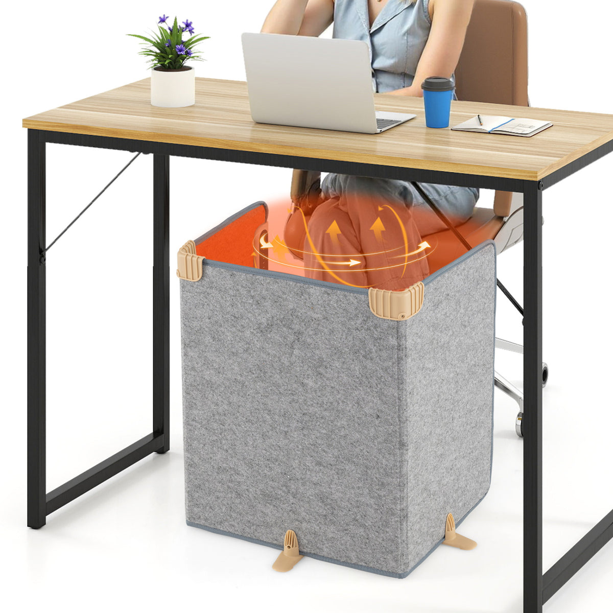 A gray folding heater enclosure sits beneath a desk, with orange arrows illustrating warmth around a seated person's legs.