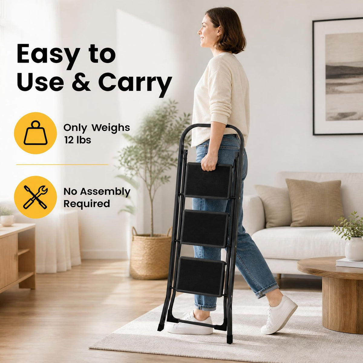 A woman carries a folded black step ladder by its top rail through a bright living room.