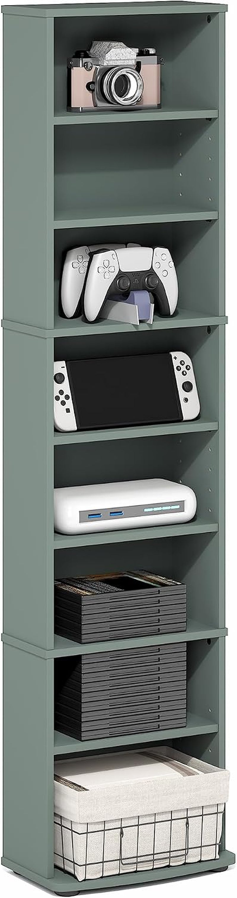 Slim vertical storage tower in sage green with controllers, console and a fabric basket staged on the shelves.