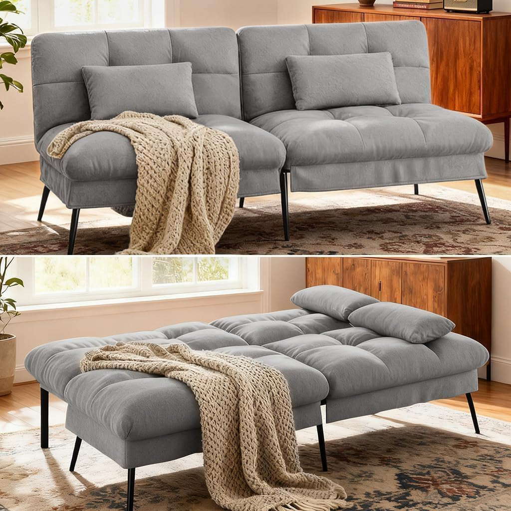 Light gray futon shown as a pair of seats and converted flat into a low-profile bed with pillows.