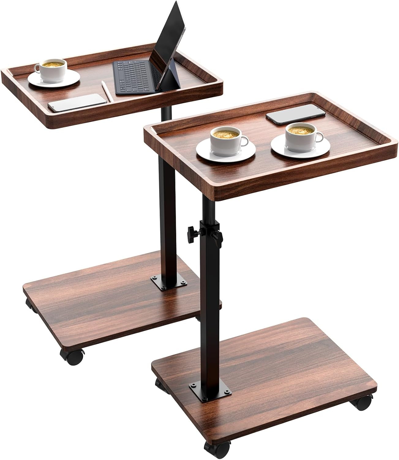 Two walnut brown C-tables with tray-style wood-grain tops, black metal posts and wheeled wood-grain bases.