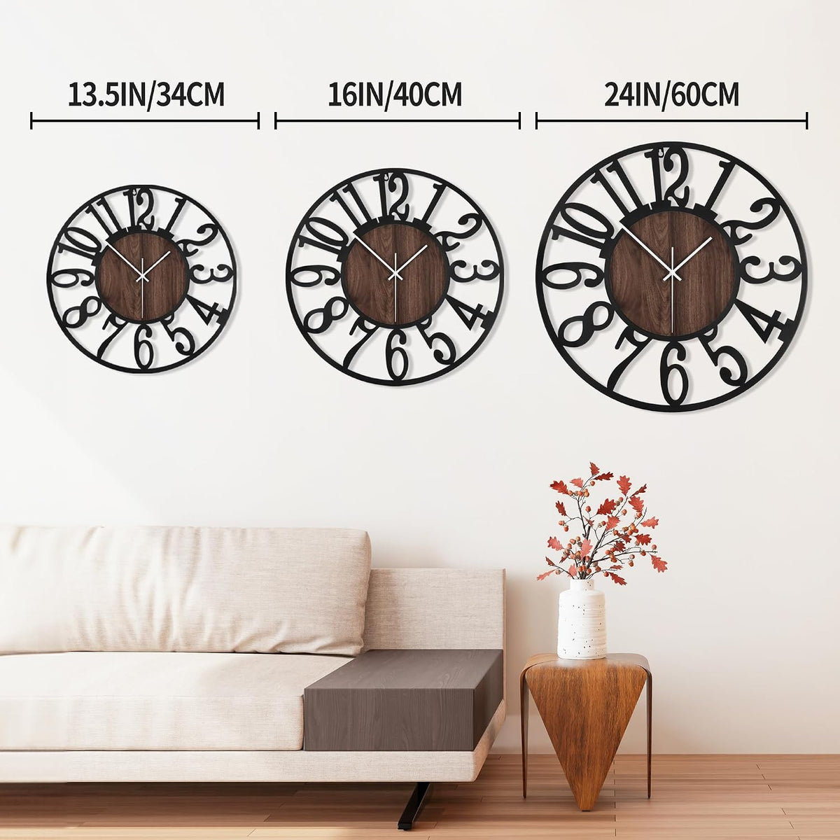 Three wall clocks displayed side-by-side showing small to large sizes with their wood-effect centers and black numerals