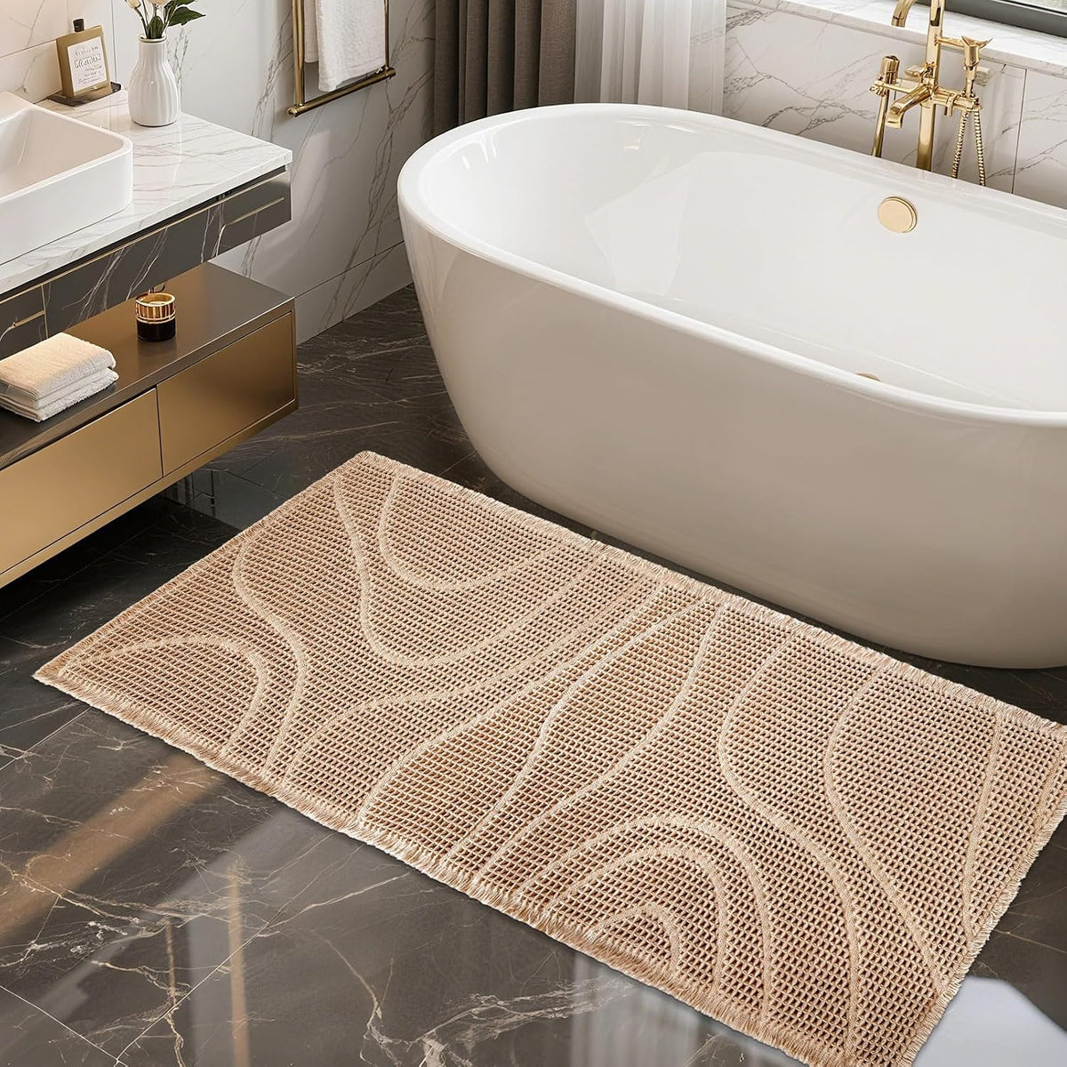 Light tan rectangular mat with raised wavy pattern laid in front of a white freestanding tub