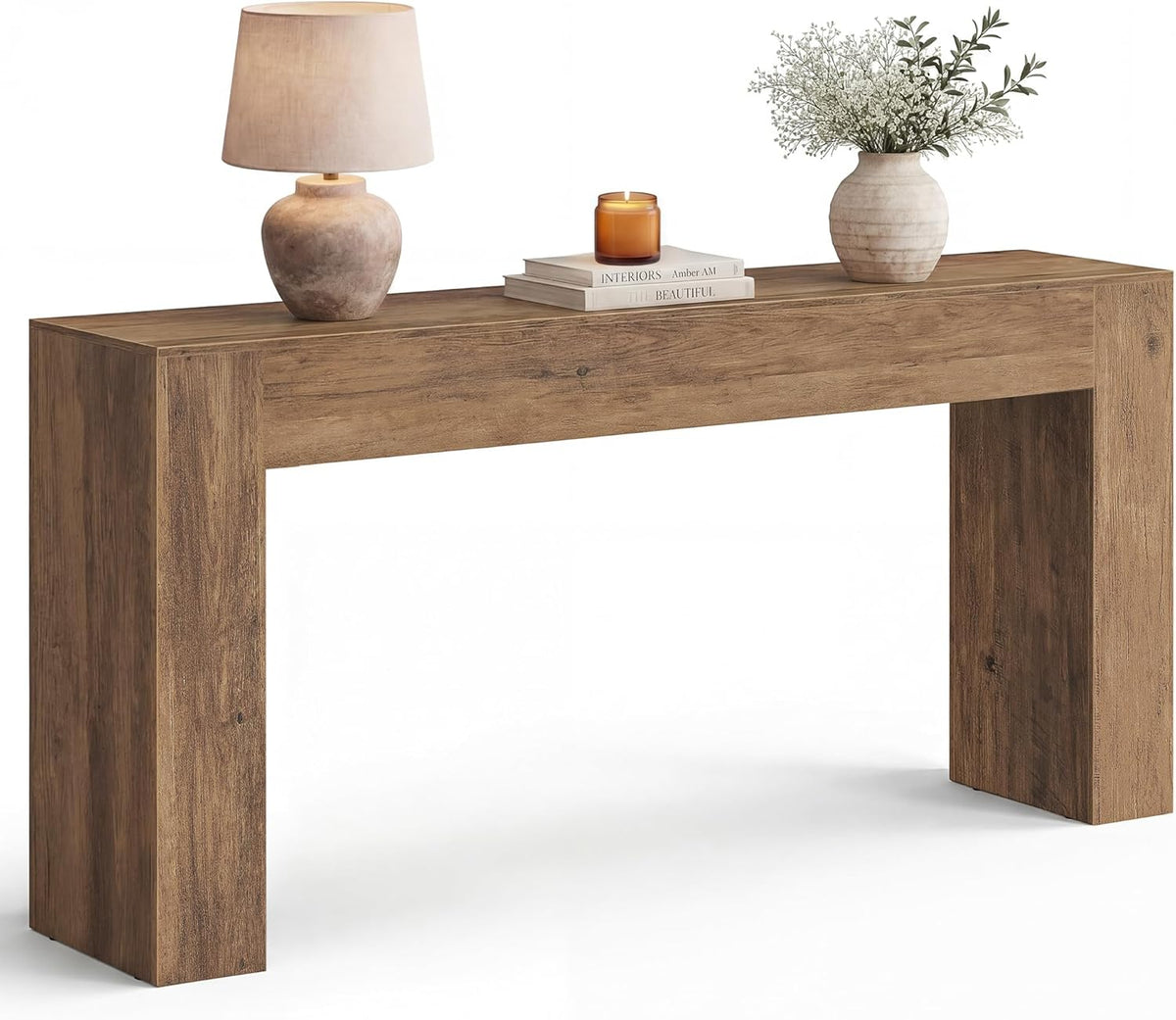Honey brown U-shaped console table front view with lamp, books, and vase on a white background