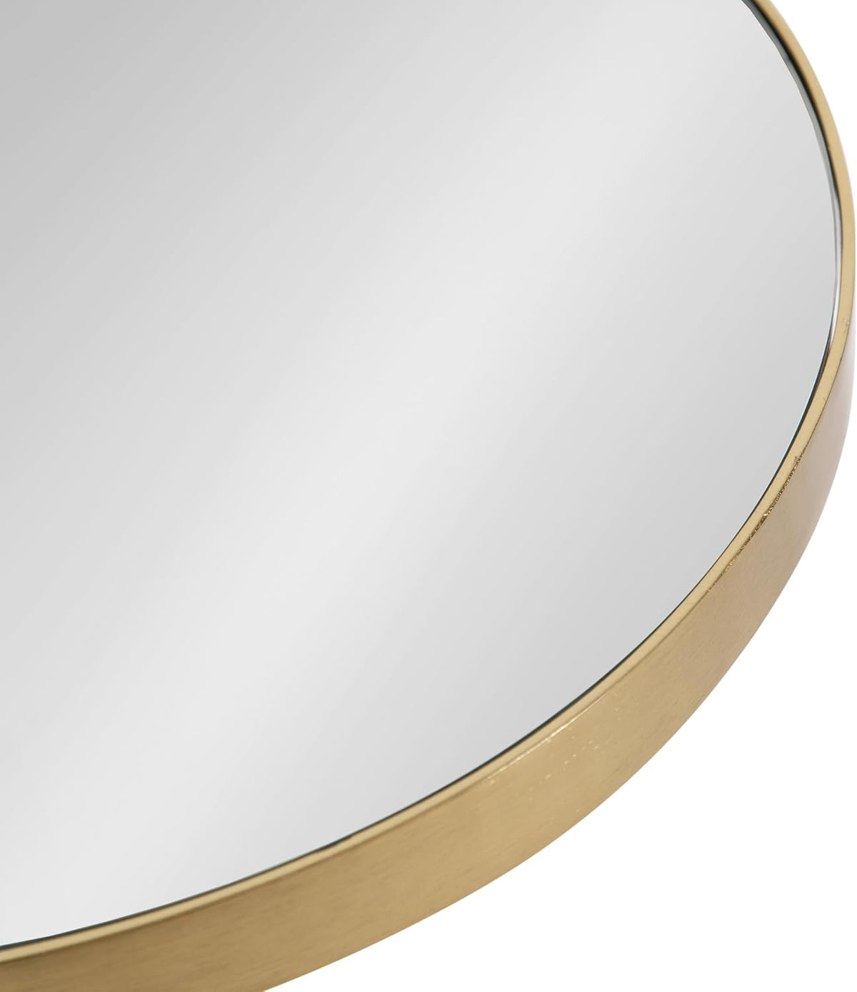 Close crop of the round mirrored tabletop showing the glass surface and a thin brushed gold rim.