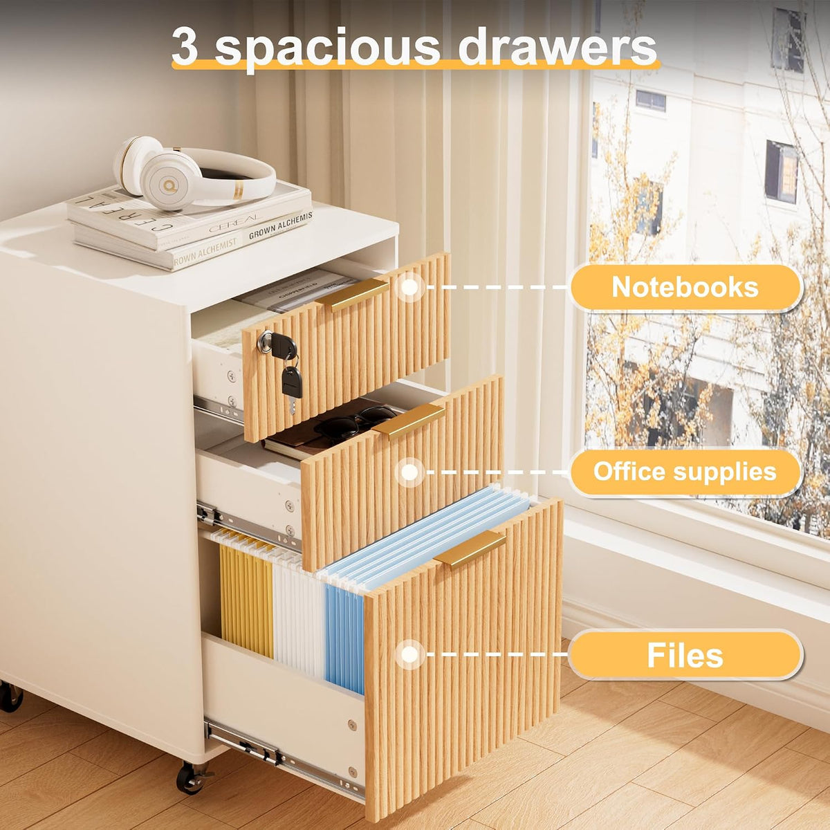 Three-drawer cabinet beside a window with the drawers partially open showing notebooks and office supplies inside