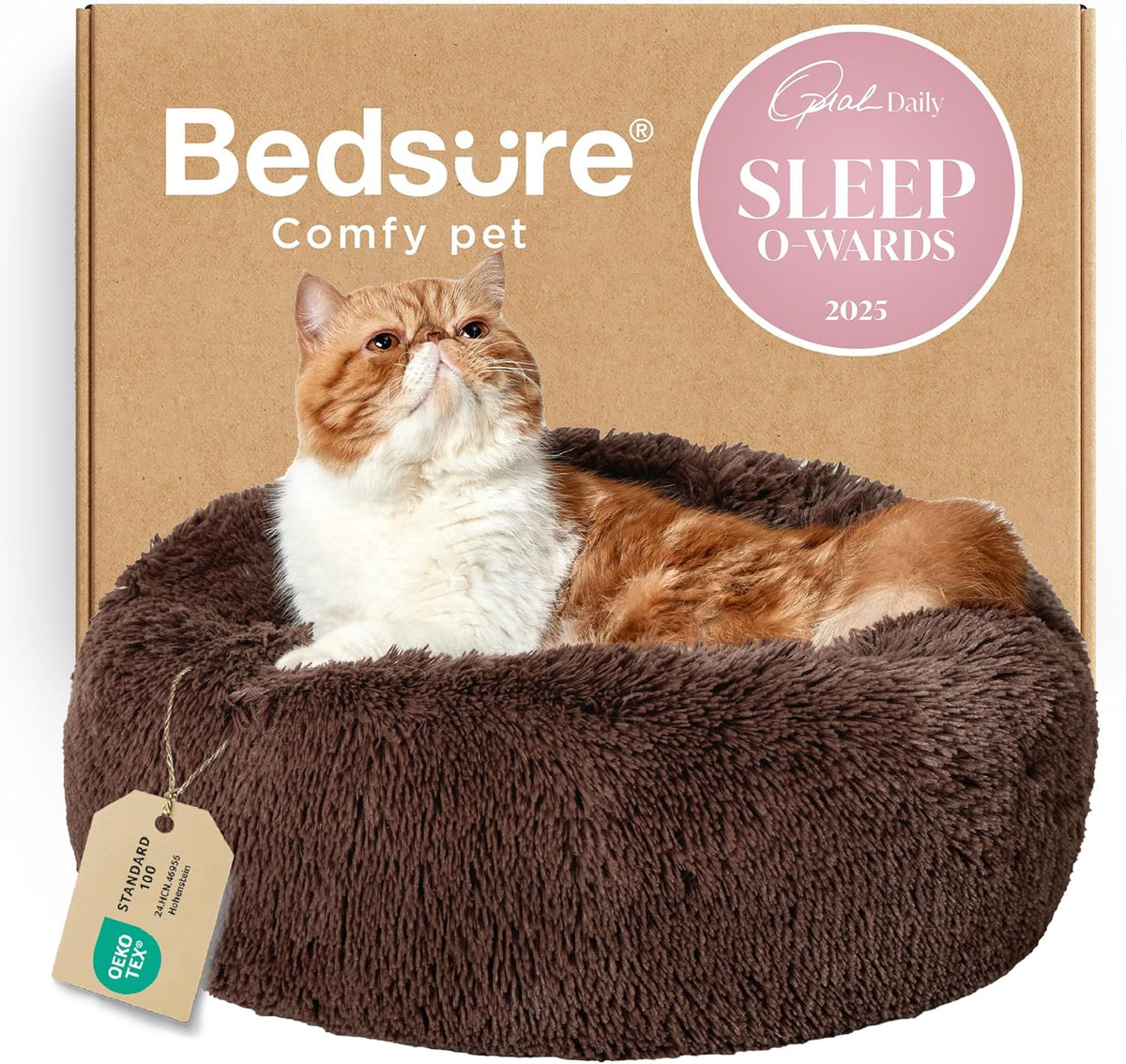 Orange-and-white cat lounging upright in a chocolate brown round faux-fur donut bed