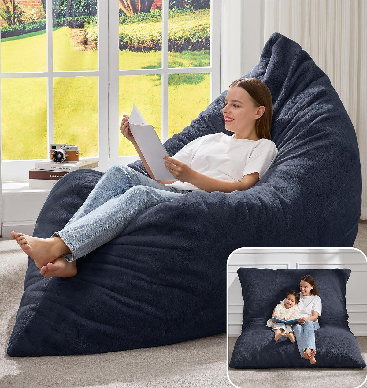 Deep navy large beanbag lounger with a woman reading by a bright window