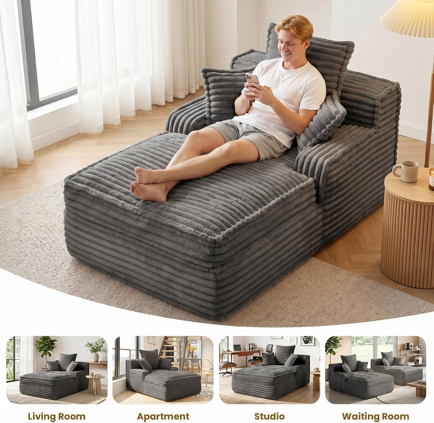 Man reclining on a grey boneless chaise lounge in a living room setting with natural light