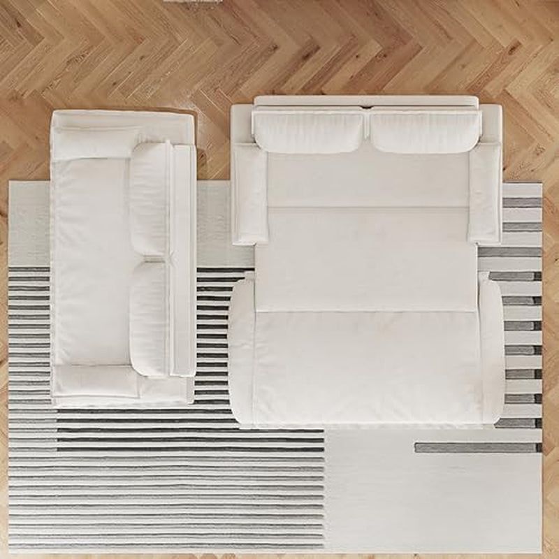 Aerial view of two beige sofa modules on a patterned rug, one shown extended into a bed and one in sofa form.