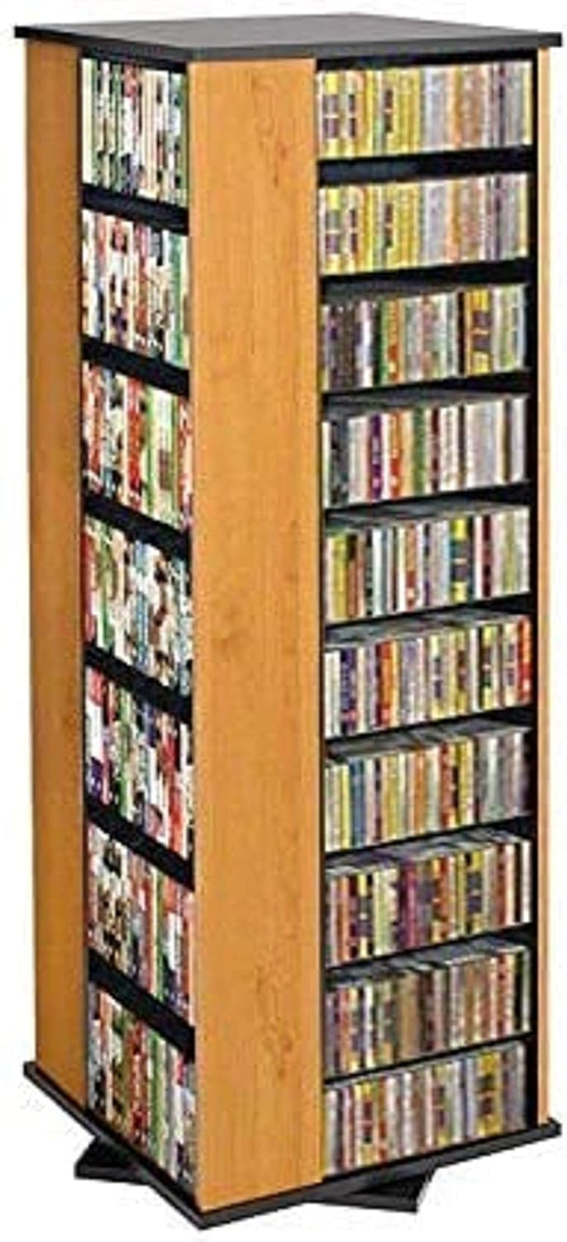 Light wood four-sided rotating media tower shown at a three-quarter angle with packed CD shelves and dark shelf trim.