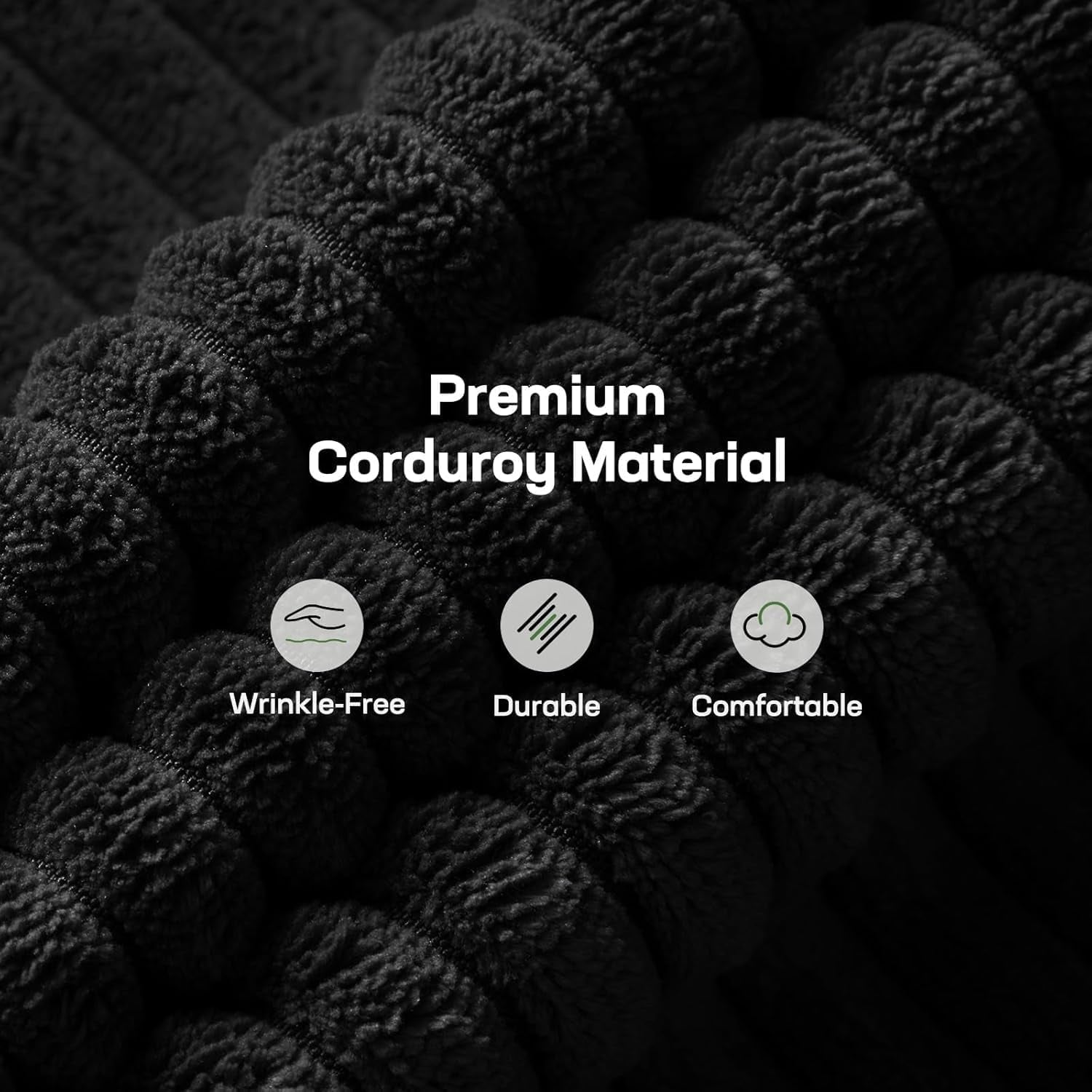 Close-up of black corduroy upholstery showing ribbed, plush textured rows.