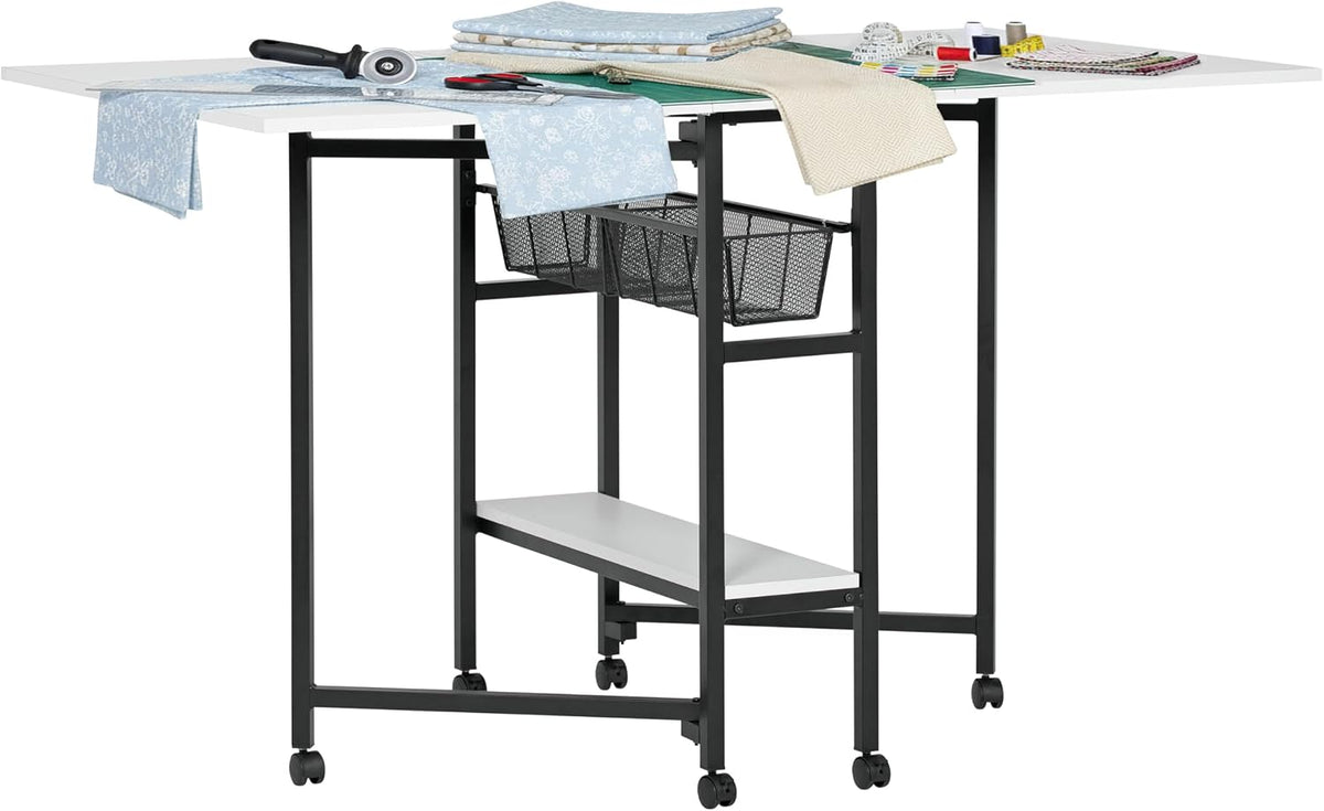 Close view of the table's black metal legs, mesh sliding baskets and a narrow lower shelf on casters.