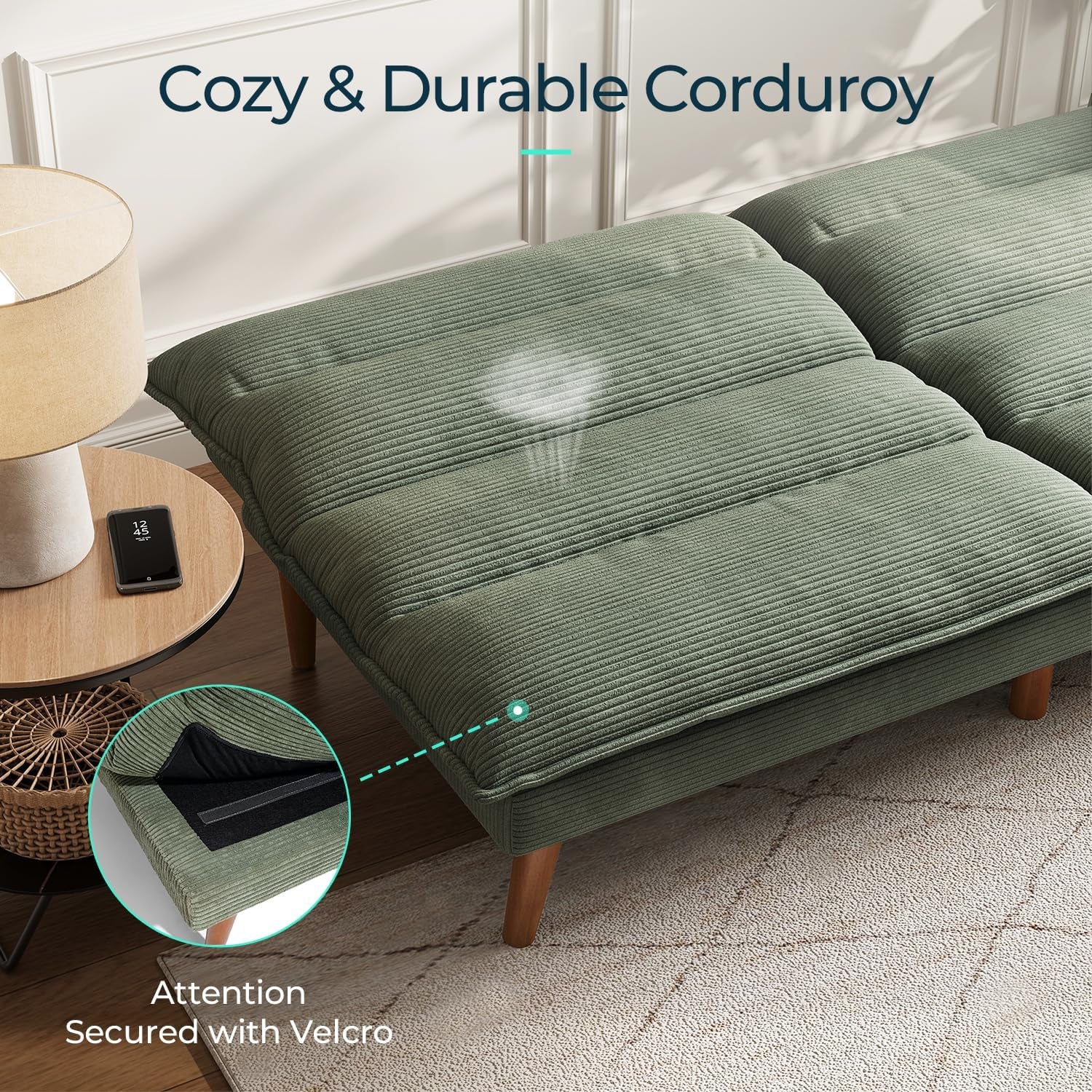 Close-up of green corduroy futon surface and cushion texture with visible seam detail