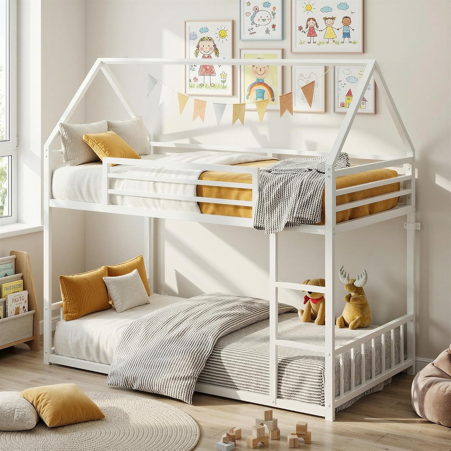 White twin-over-twin house-frame bunk bed staged in a bright nursery with pillows, toys and wall art.