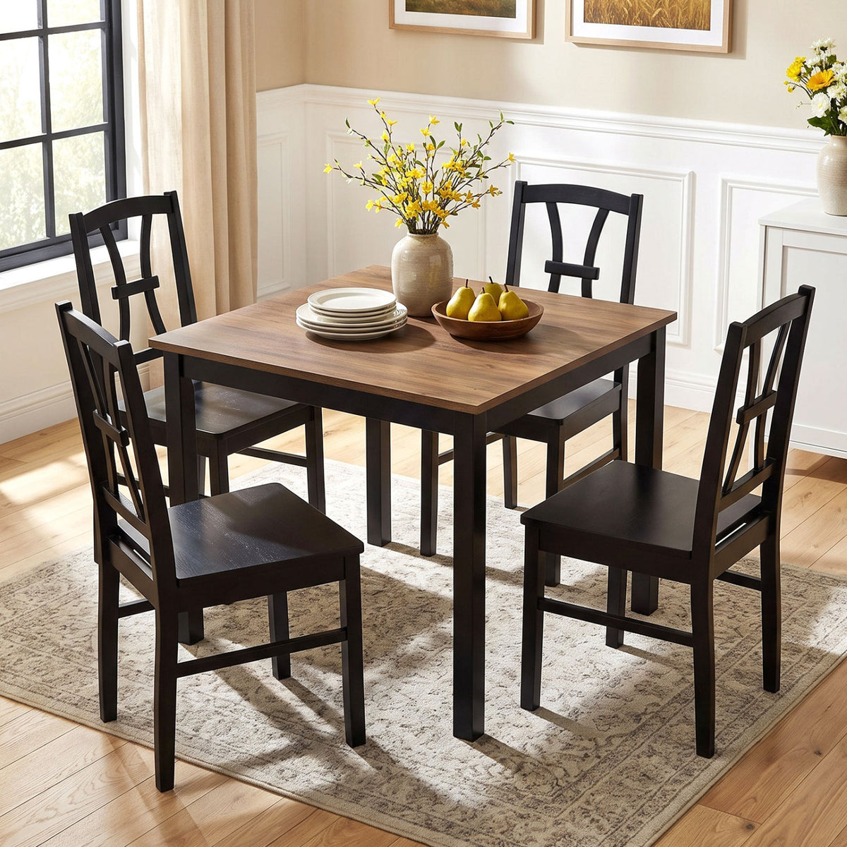 Four black cross-back chairs sit around a square wood-top table in a bright dining room.