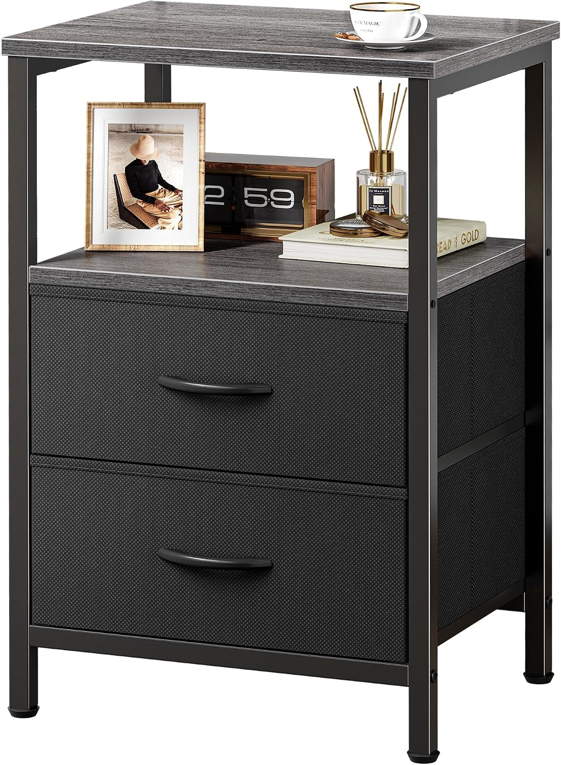 Close-up of a single nightstand showing textured black drawer fronts, gray wood top, open shelf and tabletop decor.